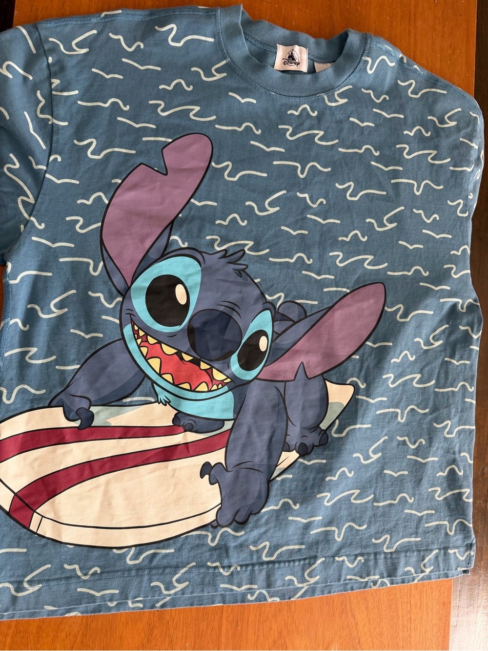 Disney Blue Stitch Surf Tee with Purple Ears and Aqua Face